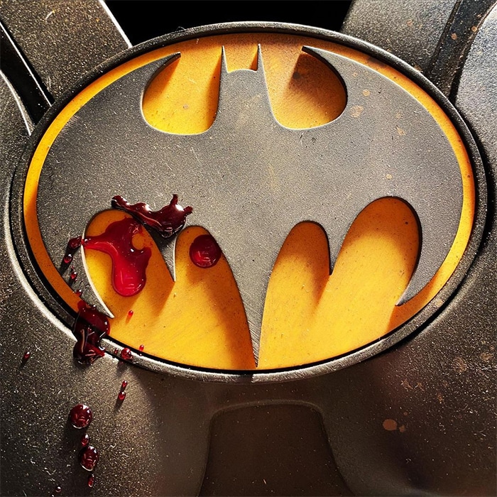 the flash batman logo - ezra miller